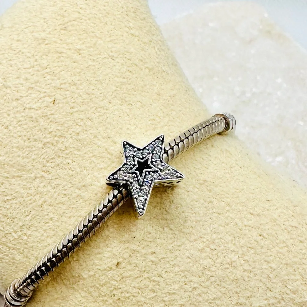 EUC Pandora 790016C01 Sterling Silver Asymmetric Star Charm w/ Clear CZ’s